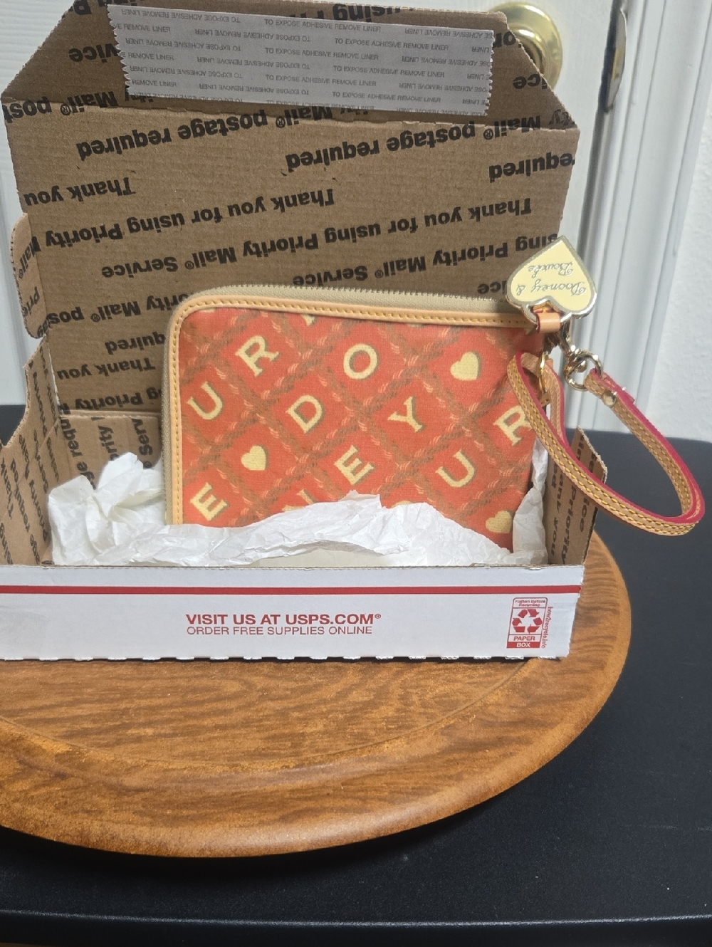 Dooney & Bourke Orange and Cream Zip Wristlet with Heart Accents